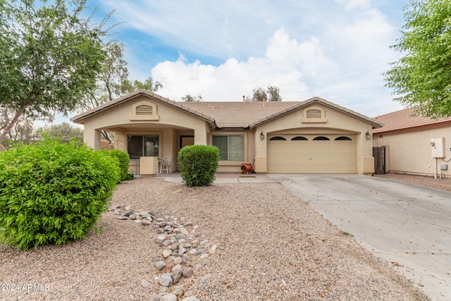 ranch-style house with a garage