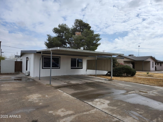 view of front of house featuring a carport