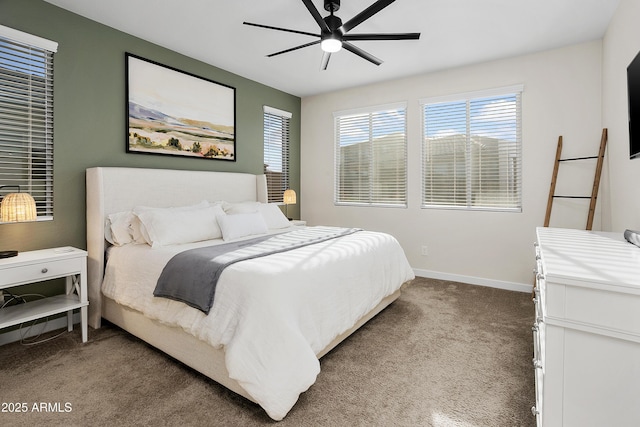 bedroom with ceiling fan and carpet floors