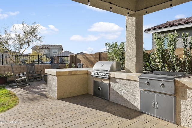 view of patio / terrace with a grill and area for grilling