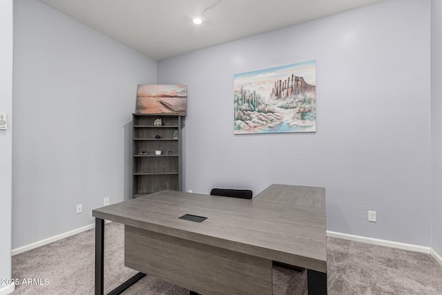 home office with baseboards and carpet flooring