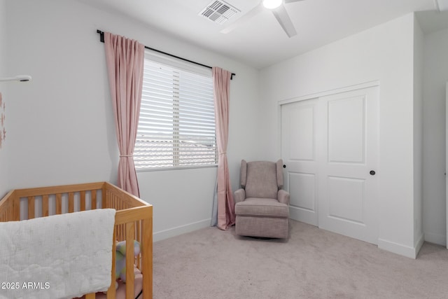 5330 W Thresher Way, Laveen, AZ 85339 - carpeted bedroom with a nursery area, a closet, baseboards, and a ceiling fan