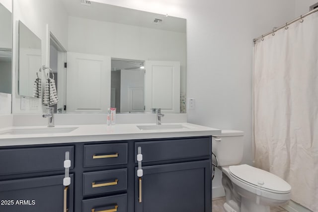 5330 W Thresher Way, Laveen, AZ 85339 - bathroom featuring double vanity, toilet, and curtained shower