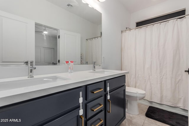 5330 W Thresher Way, Laveen, AZ 85339 - bathroom with toilet, double vanity, and tile patterned floors