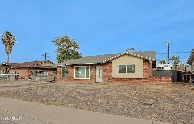 ranch-style home with a patio