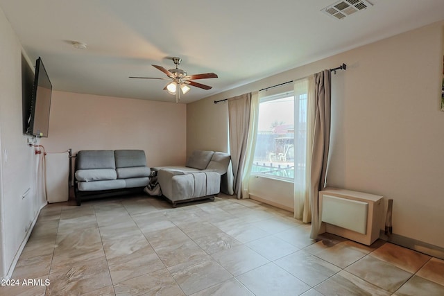 unfurnished room featuring ceiling fan