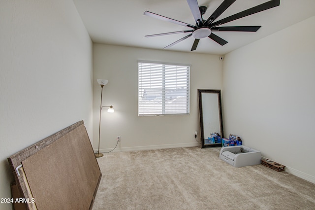 miscellaneous room with ceiling fan and carpet floors