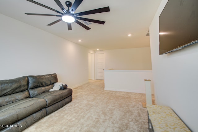 living room with light colored carpet and ceiling fan