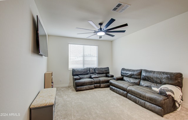 living room featuring ceiling fan and carpet flooring