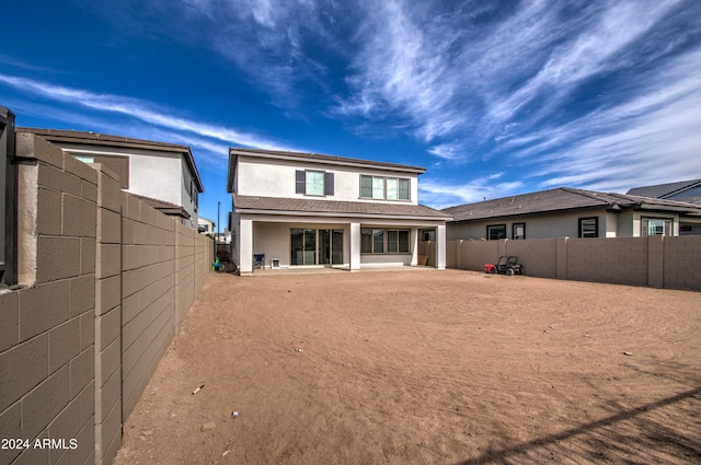 rear view of house with a patio area