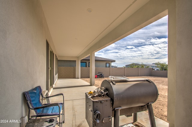 view of patio with a grill