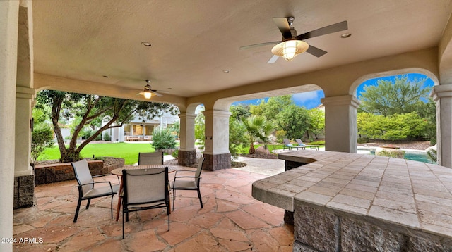 view of patio with ceiling fan