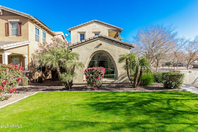 view of front of house with a front lawn