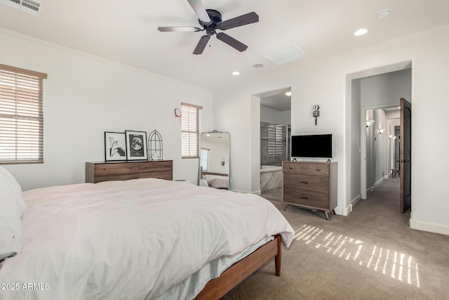 carpeted bedroom featuring ceiling fan, connected bathroom, and ornamental molding