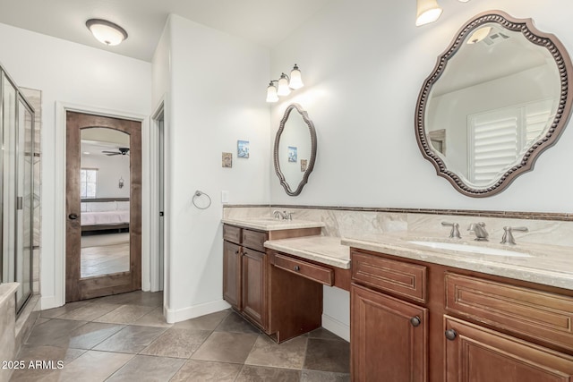 bathroom featuring walk in shower and vanity