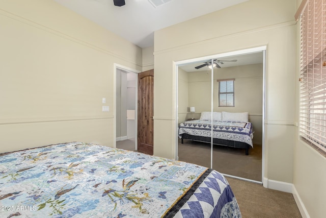 bedroom featuring ceiling fan, carpet, and a closet