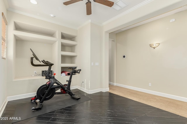 workout room featuring ceiling fan, ornamental molding, built in features, and dark hardwood / wood-style floors