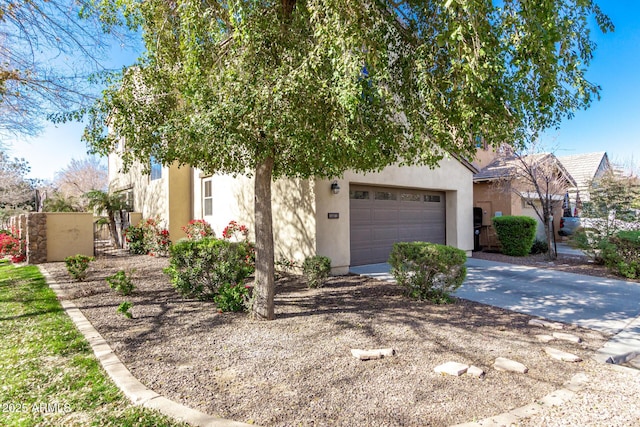 obstructed view of property featuring a garage