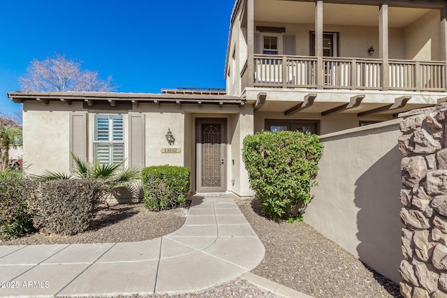 view of front of home with a balcony