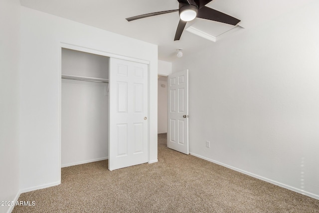 unfurnished bedroom featuring ceiling fan, carpet, a closet, and baseboards