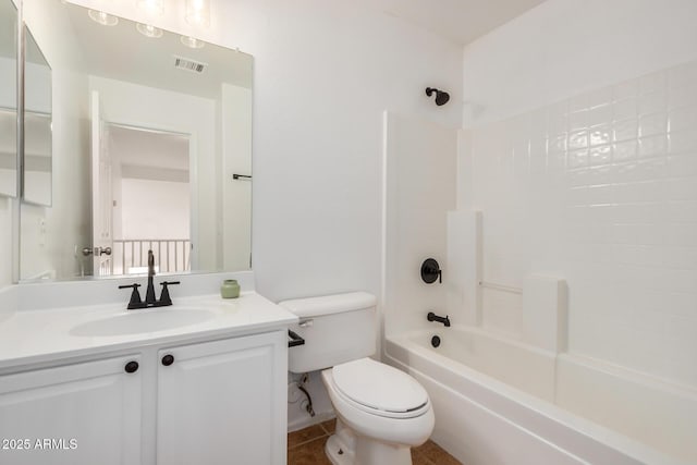 bathroom with vanity, toilet, bathtub / shower combination, and visible vents