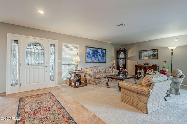 entryway with carpet, visible vents, and recessed lighting