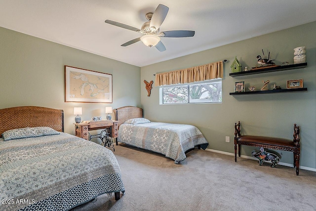 bedroom featuring a ceiling fan, carpet, and baseboards