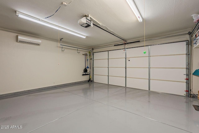 garage featuring a wall mounted AC and a garage door opener