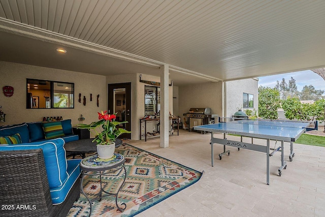 view of patio / terrace with an outdoor hangout area, outdoor dining area, and area for grilling