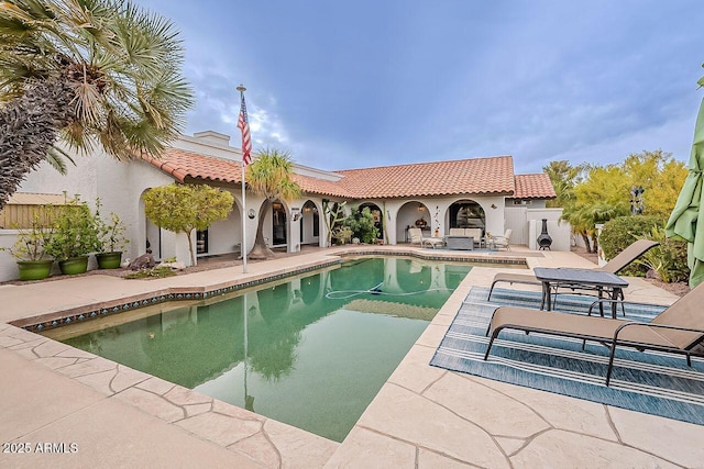 pool featuring a patio