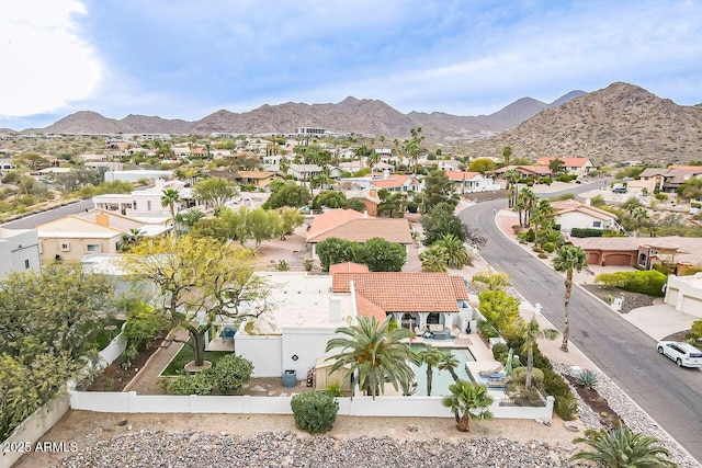 drone / aerial view with a mountain view and a residential view