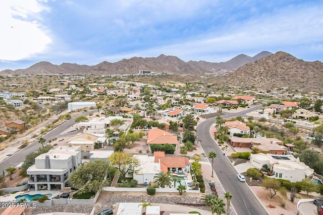 bird's eye view with a residential view and a mountain view