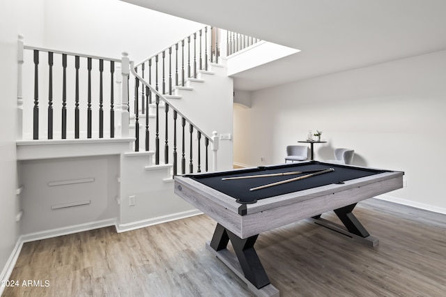 playroom with hardwood / wood-style floors and pool table