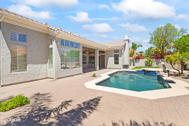 view of swimming pool featuring a patio area
