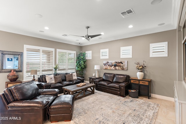 living room featuring crown molding and ceiling fan