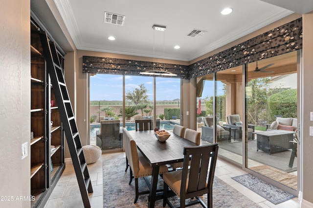 tiled dining room with crown molding