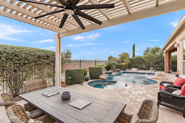 view of patio / terrace featuring an in ground hot tub, pool water feature, ceiling fan, and a pergola