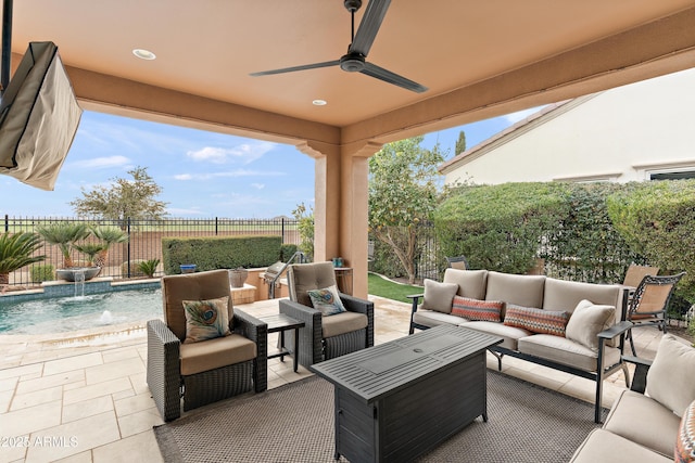 view of patio / terrace with pool water feature, ceiling fan, and outdoor lounge area