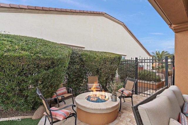 view of patio / terrace with a fire pit