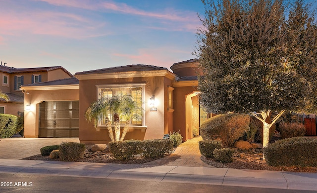 view of front of property with a garage