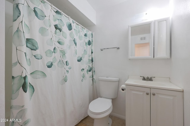 bathroom with curtained shower, tile patterned flooring, toilet, and vanity