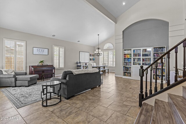 1244 W Straford Ave, Gilbert, AZ 85233 - living room with healthy amount of natural light, stairs, a chandelier, high vaulted ceiling, and baseboards