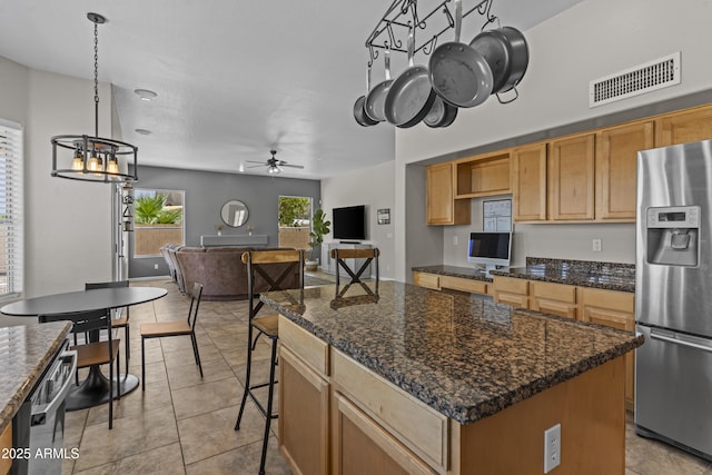 1244 W Straford Ave, Gilbert, AZ 85233 - kitchen with stainless steel refrigerator with ice dispenser, a chandelier, a ceiling fan, open floor plan, and light tile patterned flooring