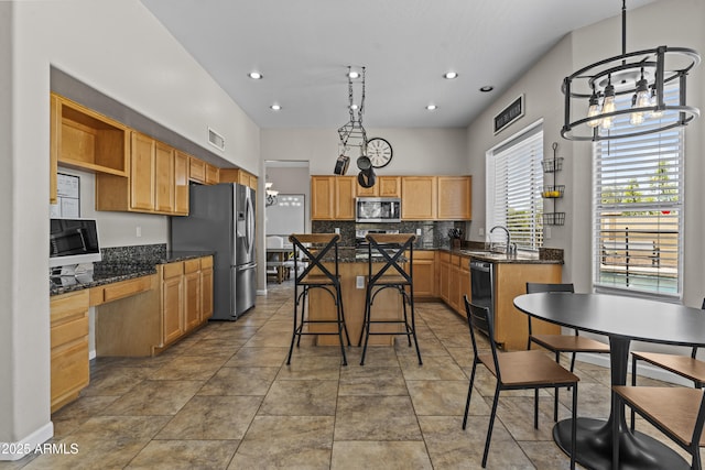 1244 W Straford Ave, Gilbert, AZ 85233 - kitchen featuring stainless steel appliances, open shelves, a sink, a kitchen island, and backsplash