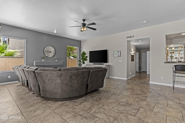1244 W Straford Ave, Gilbert, AZ 85233 - living room with ceiling fan and baseboards