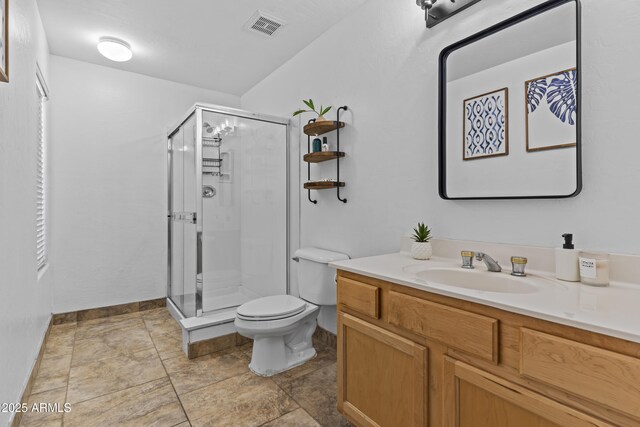 1244 W Straford Ave, Gilbert, AZ 85233 - bathroom featuring toilet, vanity, a shower stall, and baseboards