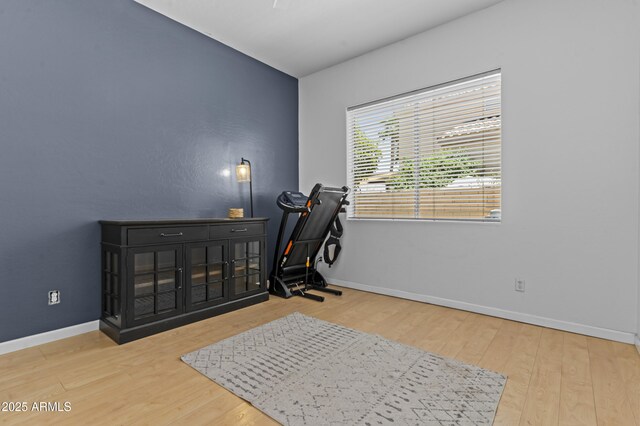 1244 W Straford Ave, Gilbert, AZ 85233 - exercise room featuring wood finished floors and baseboards