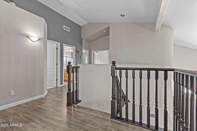 1244 W Straford Ave, Gilbert, AZ 85233 - hallway with an upstairs landing, lofted ceiling, wood finished floors, and baseboards