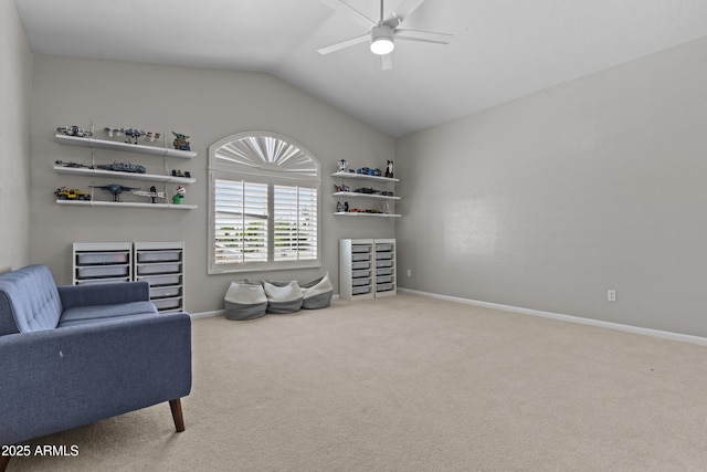 1244 W Straford Ave, Gilbert, AZ 85233 - sitting room with carpet floors, vaulted ceiling, a ceiling fan, and baseboards
