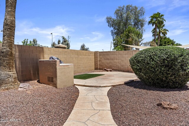 1244 W Straford Ave, Gilbert, AZ 85233 - fenced backyard with a patio